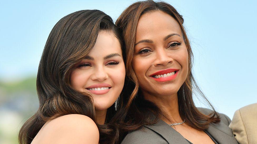 Selena Gomez and Zoe Saldana attends the "Emilia Perez" Photocall at the 77th annual Cannes Film Festival at Palais des Festivals on May 19, 2024 in Cannes, France