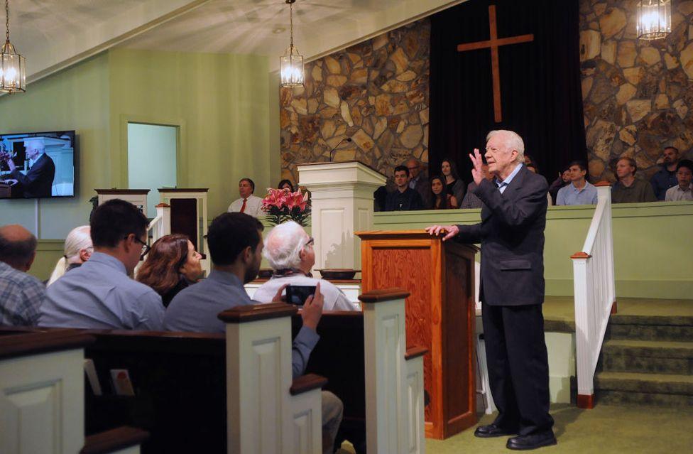 Former U.S. President Jimmy Carter speaks to the congregation at Maranatha Baptist Church before teaching Sunday school in his hometown of Plains, Georgia on April 28, 2019.