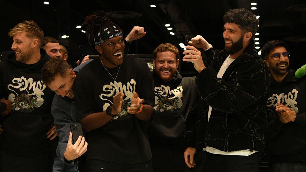 The Sidemen standing in a row laughing, clapping and in celebratory poses, when opening a store in the Bullring Shopping Centre, Birmingham, in October 2024