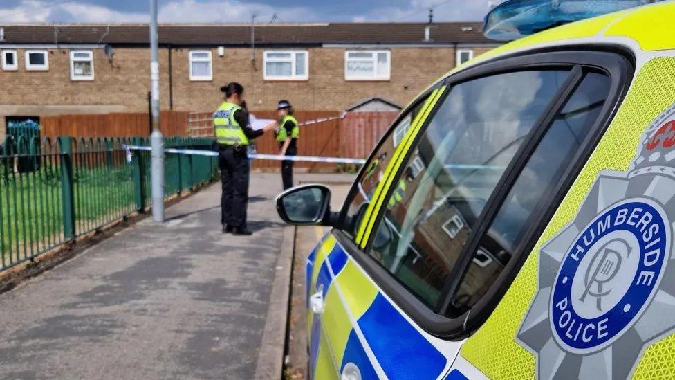 Police officers at a cordon in Arundel Close, Hull