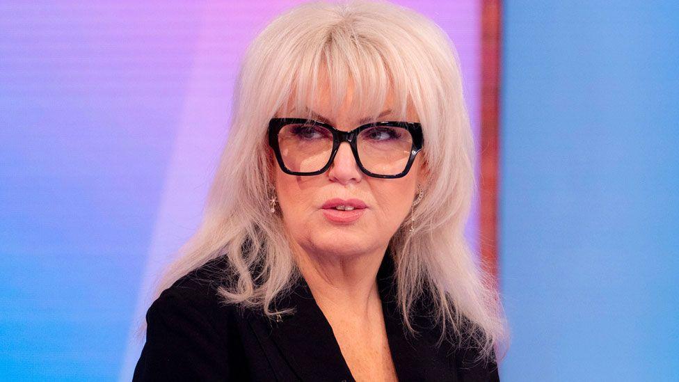 Baroness Helen Newlove wearing black-framed glasses and a black jacket as she appears on Loose Women in January 2025