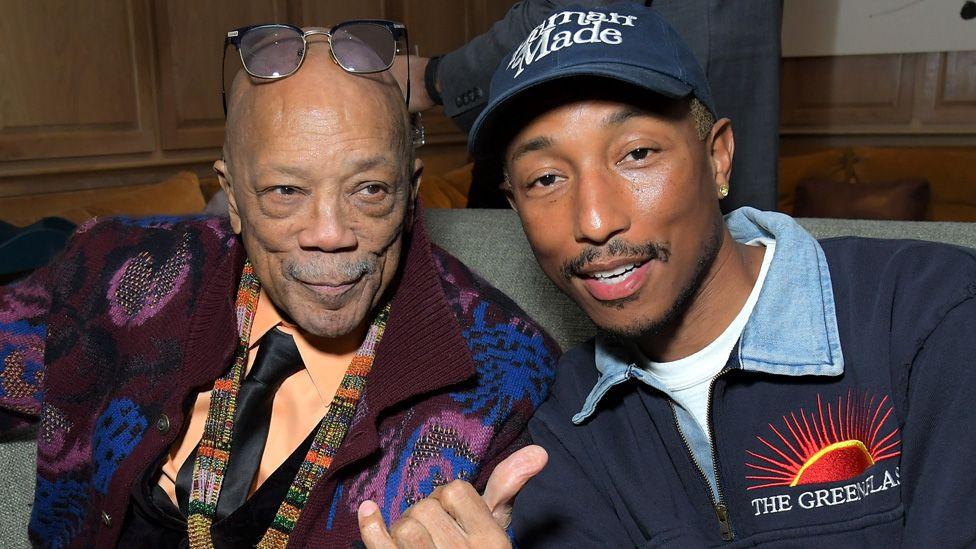 Quincy Jones and Pharrell Williams sitting together in 2020