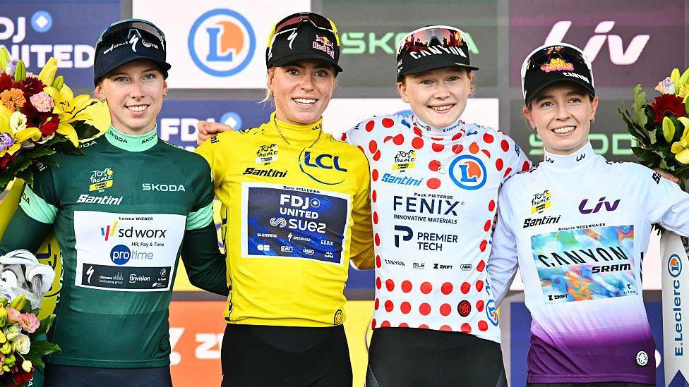 Jersey winners Lorena Wiebes, Demi Vollering, Puck Pieterse and Antonia Niedermaier on the podium after the final stage of the 2026 Tour de France Femmes