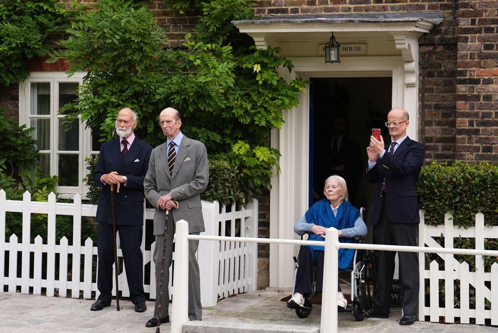 Prince Michael of Kent, the Duke of Kent, the Duchess of Kent and Lord Nicholas Windsor watch as three pipers from the Royal Scots Dragoon Guards (Carabiniers and Greys) play outside Wren House, Kensington Palace to mark the Duke of Kent's 89th birthday. 9 October 2024. 