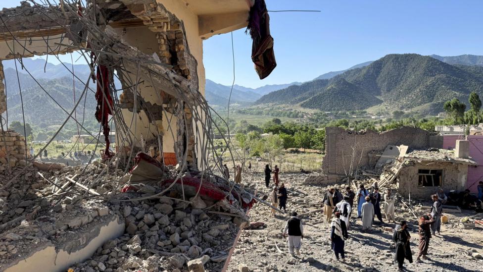 Afghan villagers in mountainous border region