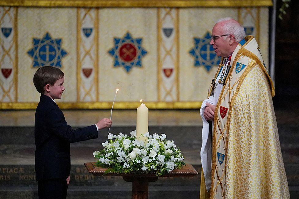 Alexander Churchill, 10, lights the VE Day 80th Candle of Peace during a Service of Thanksgiving at Westminster Abbey in London on the 80th anniversary of VE Day. Picture date: Thursday May 8, 2025.