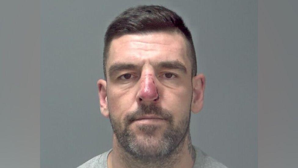 Police custody photo of Jay Cotterill