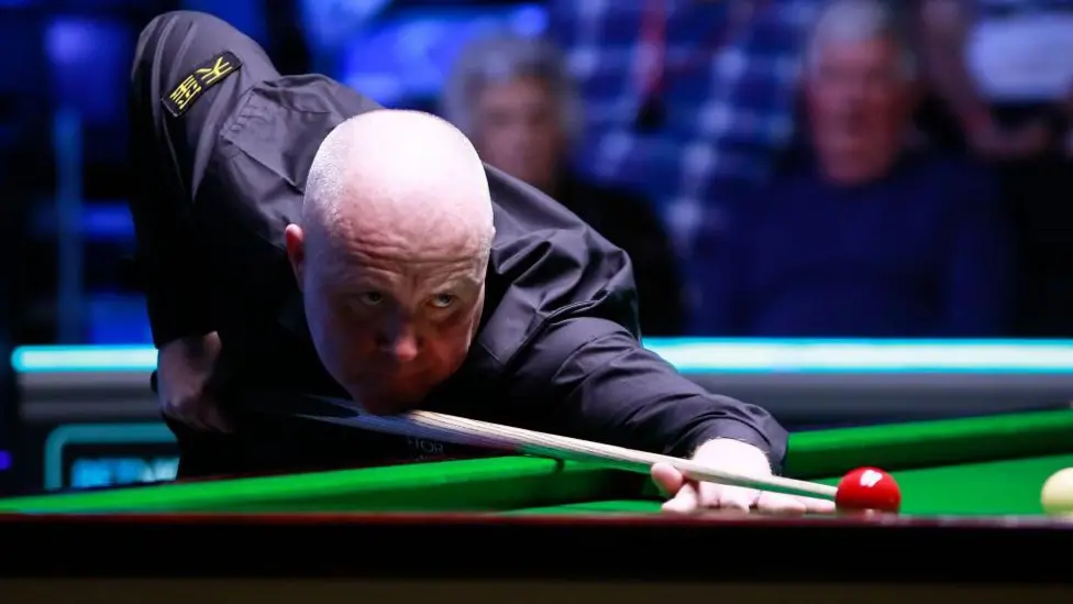 Higgins Celebrates 1,000th Century Despite English Open Loss.