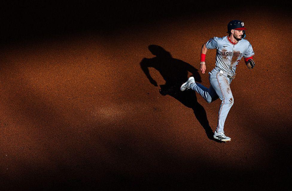 The Washington Nationals' Dylan Crews runs to the home plate during the second inning against the New York Mets at Citi Field