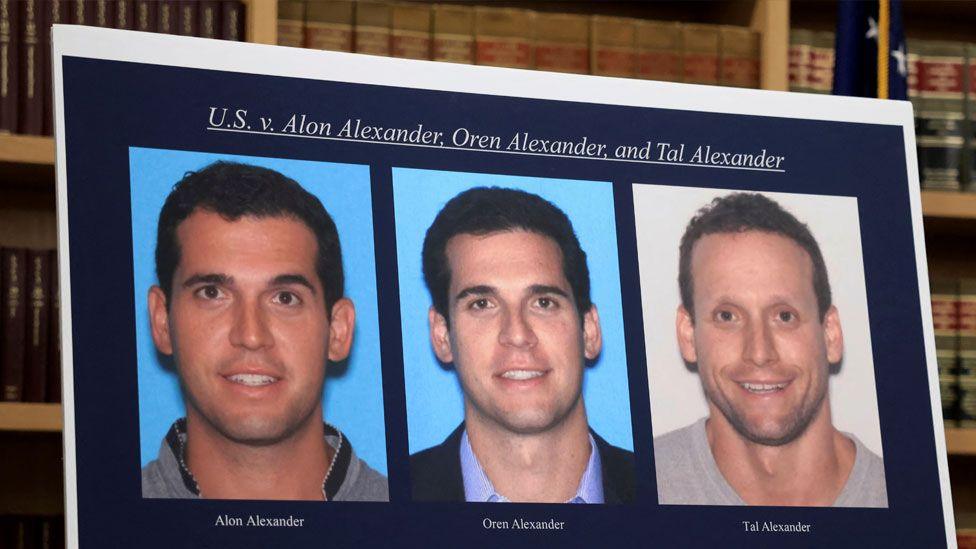 Photographs of Alon, Oren, and Tal Alexander displayed prior to a news conference in New York.