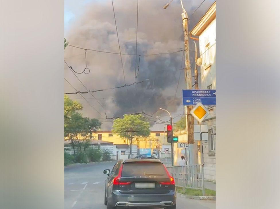 A plume of smoke rising over Novorossiysk