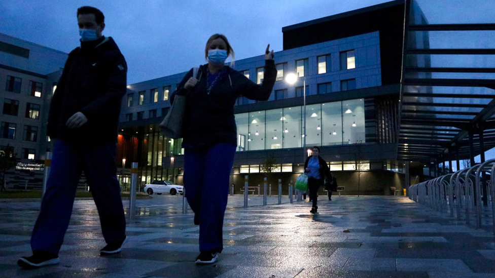 Medical staff leaving The Grange Hospital in Cwmbran late at night