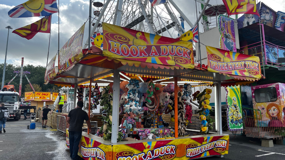 A Hook a Duck stall at Nottingham's Goose Fair as it opens for the evening
