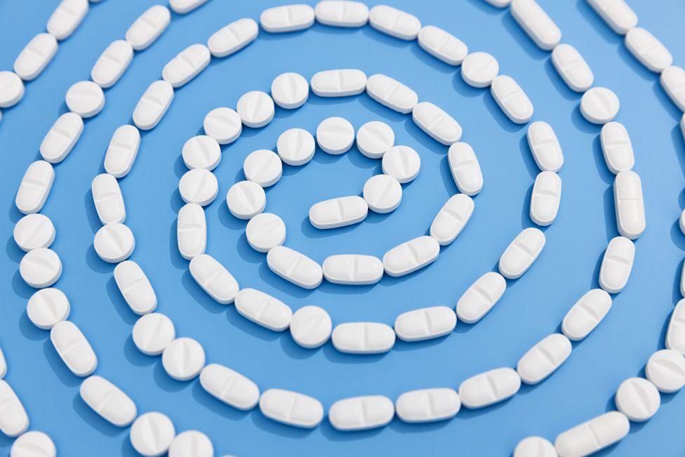 Medication on a blue background