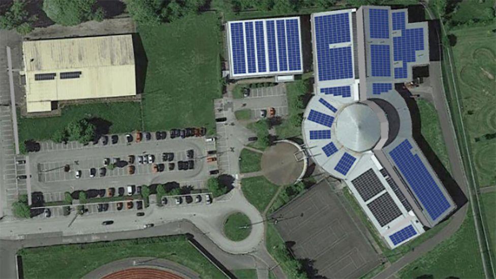 An aerial illustration showing how the blue solar panels will be fitted on the roof of the leisure centre