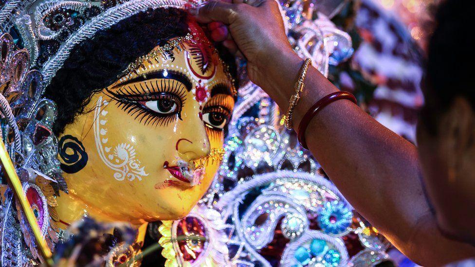 painted statue of the goddess Durga 