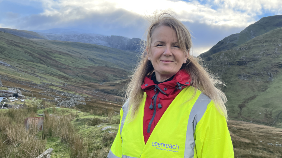 Openreach chief engineer for Wales Suzanne Rutherford stands in Cwm Bwrnynog valley by Hafodty farmhouse, below Yr Wyddfa - Snowdon