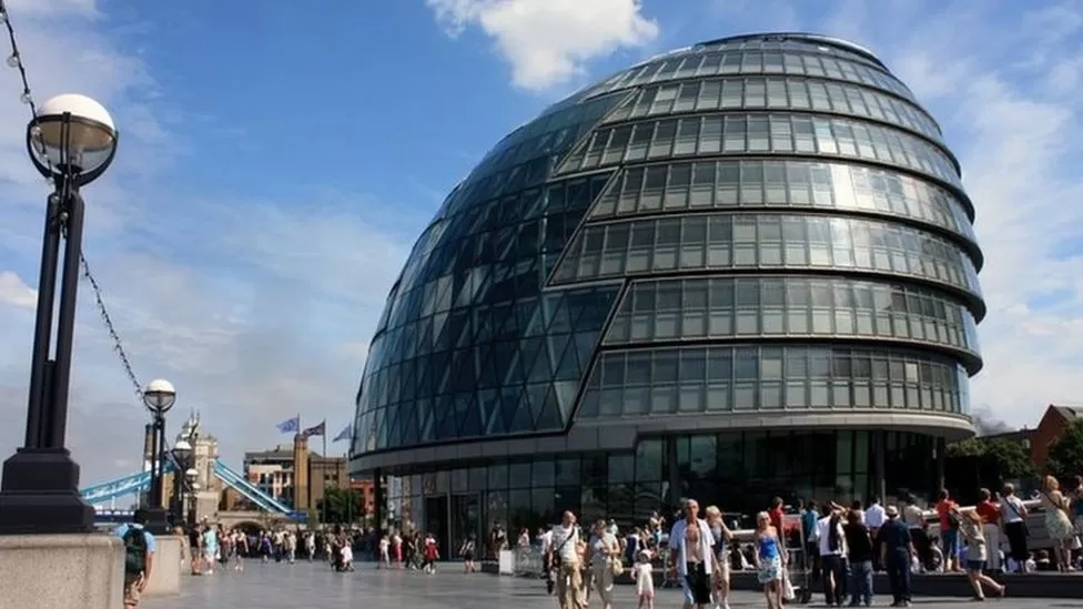 City Hall surrounded by bystanders and the public