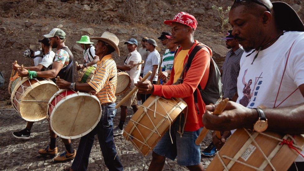 People playing the drums during the Cape Verde pilgrimage in Porto Novo