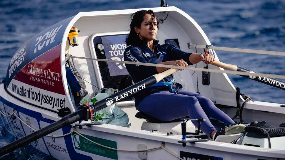 Ananya Prasad rowing in her boat