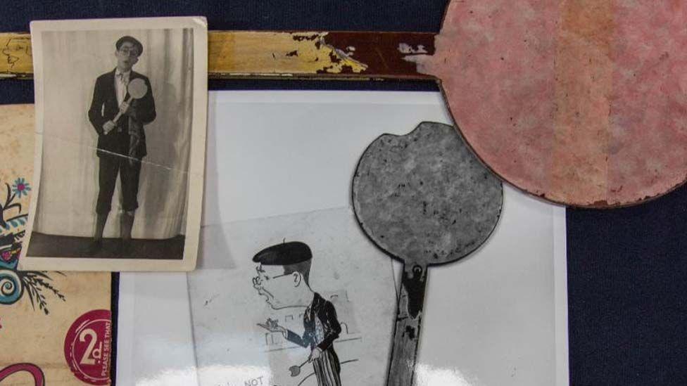 A circa 1940 stage prop in the form of a partially-eaten lollipop, used by a young Eric Morecambe in his routine "Youth Takes a Bow"