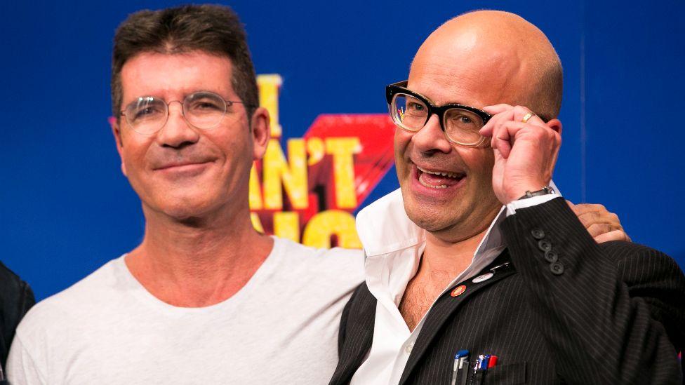 Simon Cowell and Harry Hill attend a photocall to launch "I Can't Sing - The X Factor Musical" at RADA on September 2, 2013 in London, England