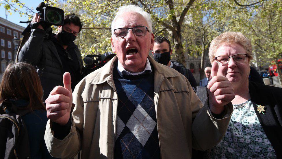 Former post office worker Noel Thomas, who was convicted of false accounting in 2006, celebrates with his daughter Sian outside the Royal Courts of Justice, London, after having his conviction overturned by the Court of Appeal