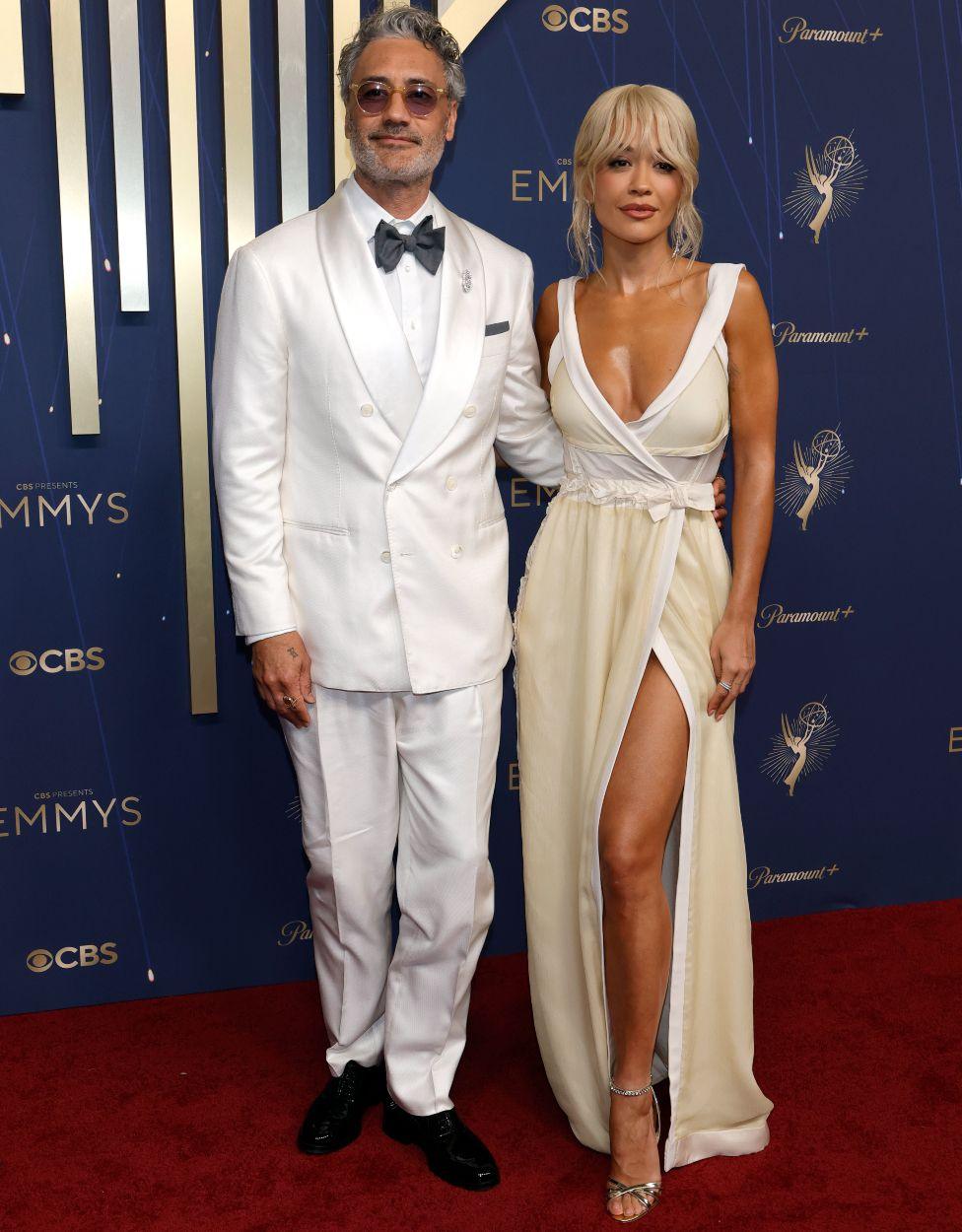 Taika Waititi and Rita Ora attend the 77th Primetime Emmy Awards at Peacock Theater on September 14, 2025 in Los Angeles, California