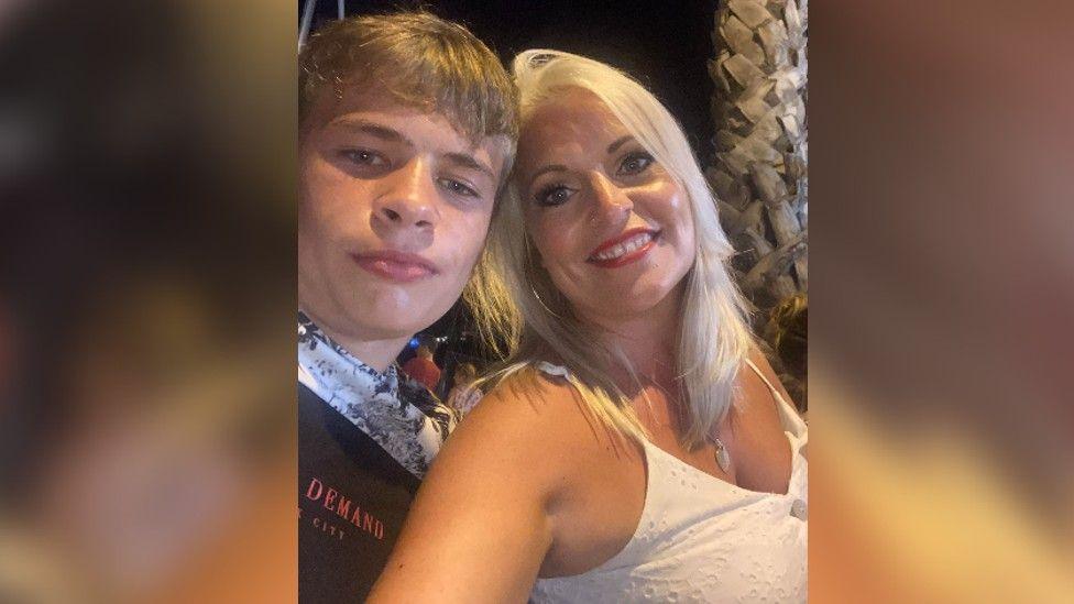 A selfie of Mikey Roynon and his mum Hayley, who is in a white top and smiling