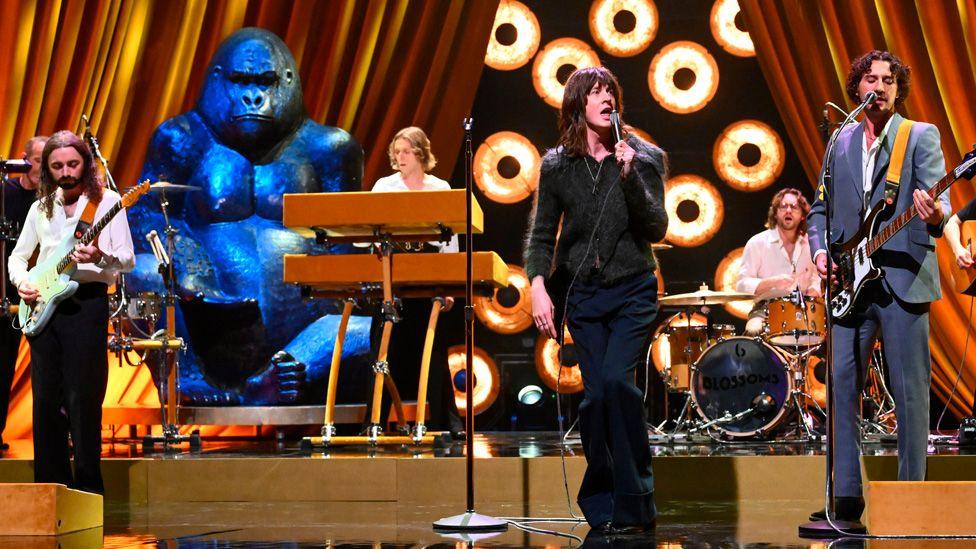 Blossoms performing on Later... With Jools Holland, with the giant Gary gorilla behind them