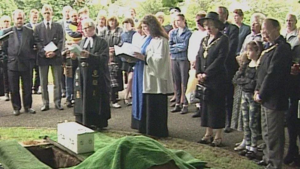 Local people arranged a burial and a funeral service for the infant