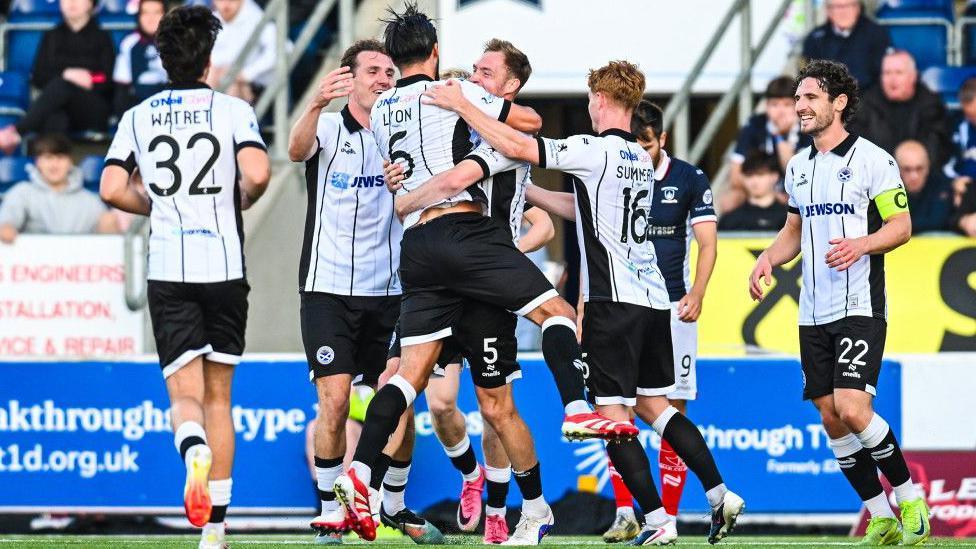 Ayr United players celebrating