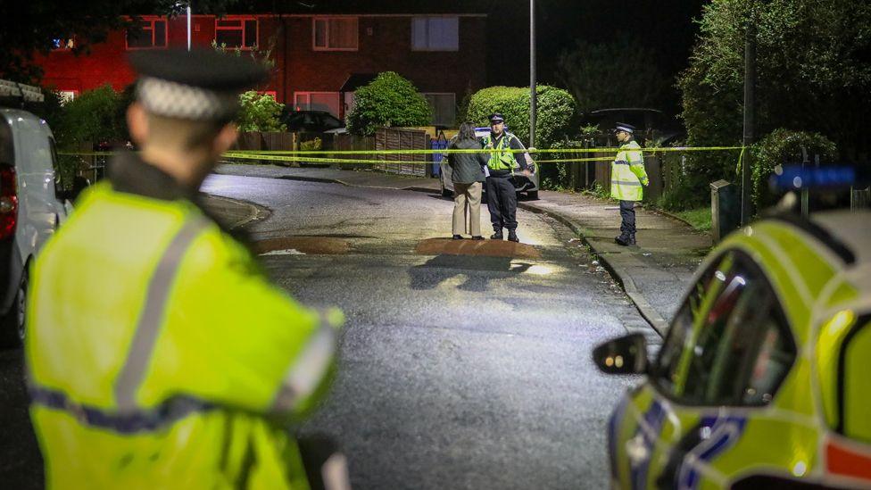 Police at Aspinall Crescent in Salford