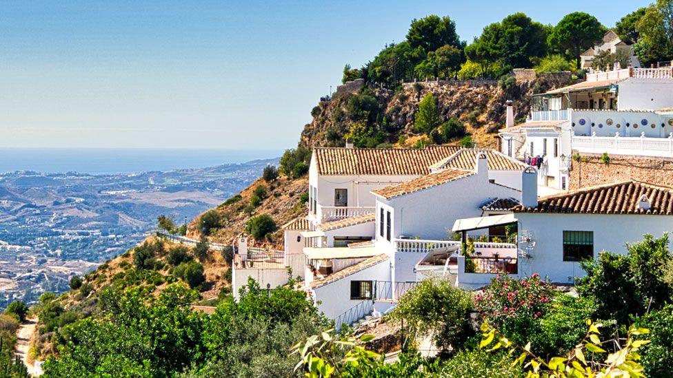 A scenic view of homes on a hilltop in Spain's Costa del Sol