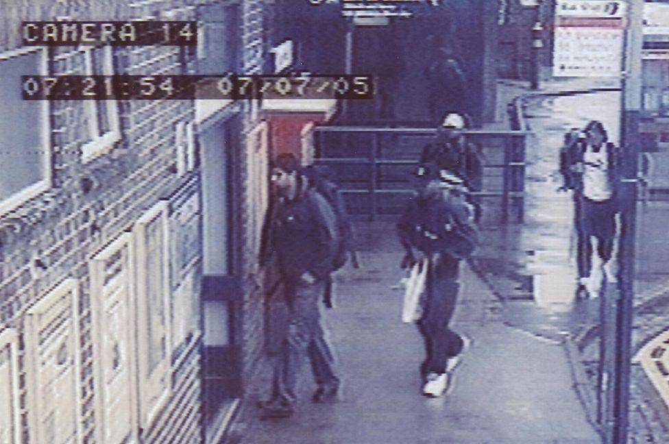 Metropolitan Police handout photo issued Saturday July 16 2005 of a CCTV image of the four London bombers arriving at Luton train station at 0721 on Thursday July 7. The image shows from left to right Hasib Hussain, Germaine Lindsay (dark cap), Mohammed Sidique Khan (light cap) and Shahzad Tanweer.