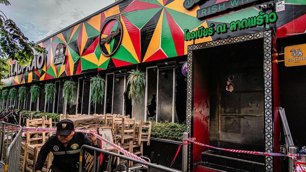 Death toll from Bangkok bar fire rises to 30 as police probe safety lapses