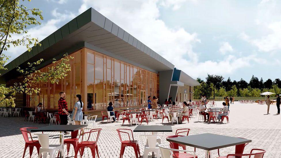 A cafe terrace with seats outside in red and white with people sitting and standing up chatting and relaxing