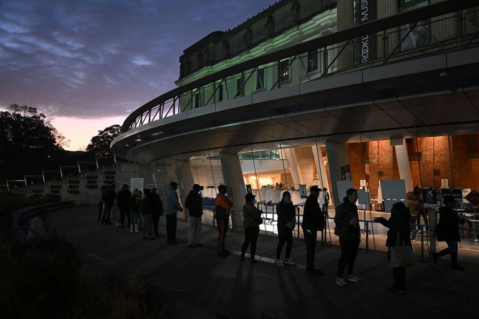 People wait in line to vote at the Brooklyn Museum on 5 November 2024 in New York City