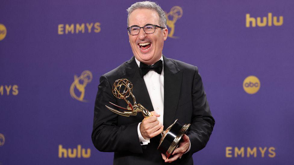 John Oliver poses with the Outstanding Scripted Variety Series award for "Last Week Tonight with John Oliver" at the 76th Primetime Emmy Awards in Los Angeles, California, U.S., September 15, 2024