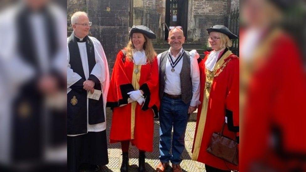 Mr Walker standing next to civic dignitaries