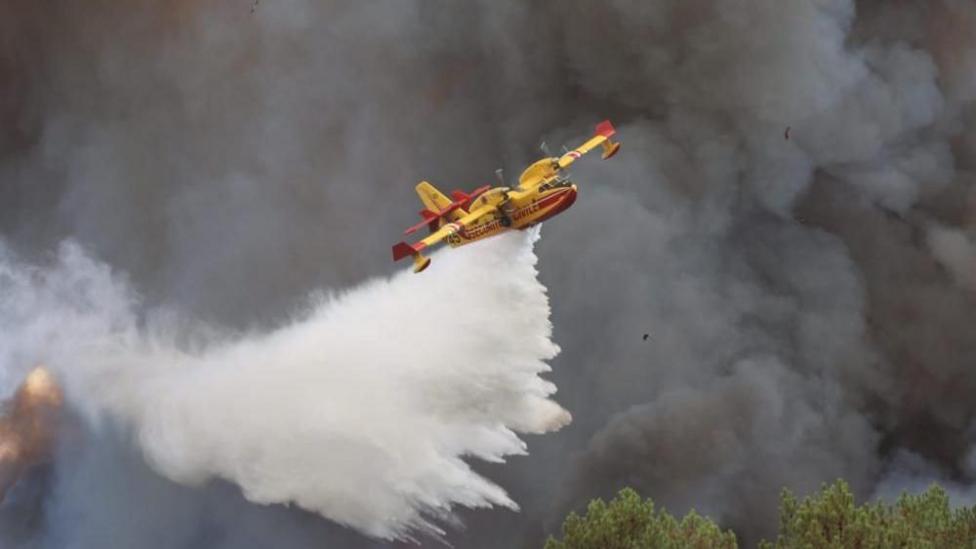 France fire crews face searing heat in battle to contain flames