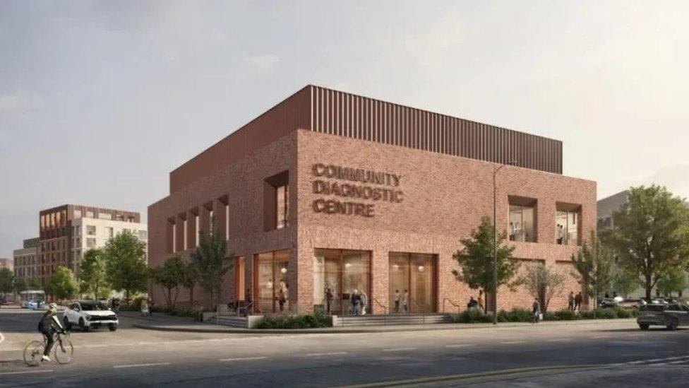 Artist impression of the Community Diagnostic Centre a two-storey building in red brick with a glass entrance and trees around it