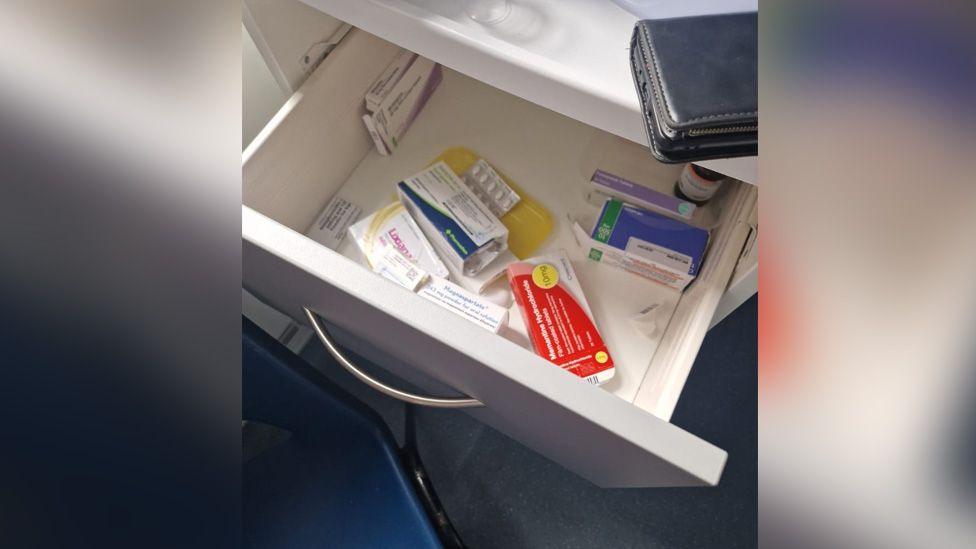 Lilian's medication in an unlocked drawer, packets are visible. 