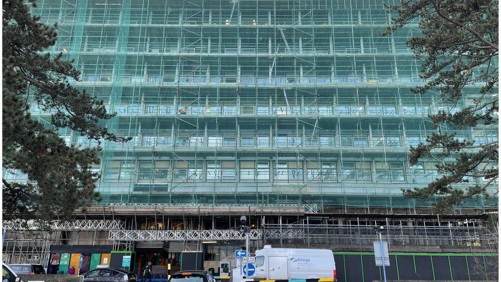 Wycombe hospital with netting and scaffolding