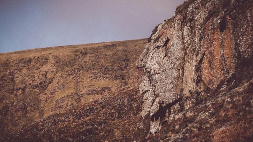 A rock face in southern Scotland which appears to have almost human features in it