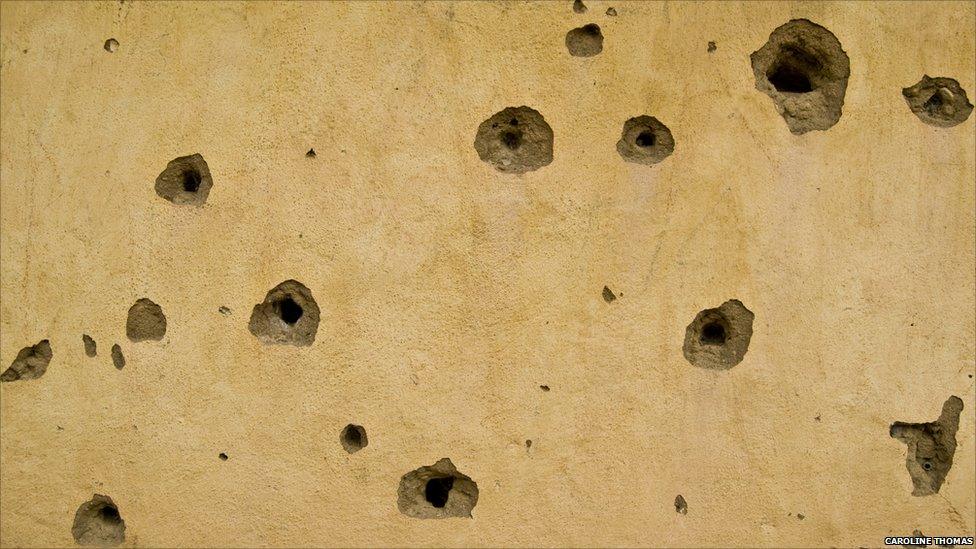 Bullet holes in the mosque in the village of Potoru