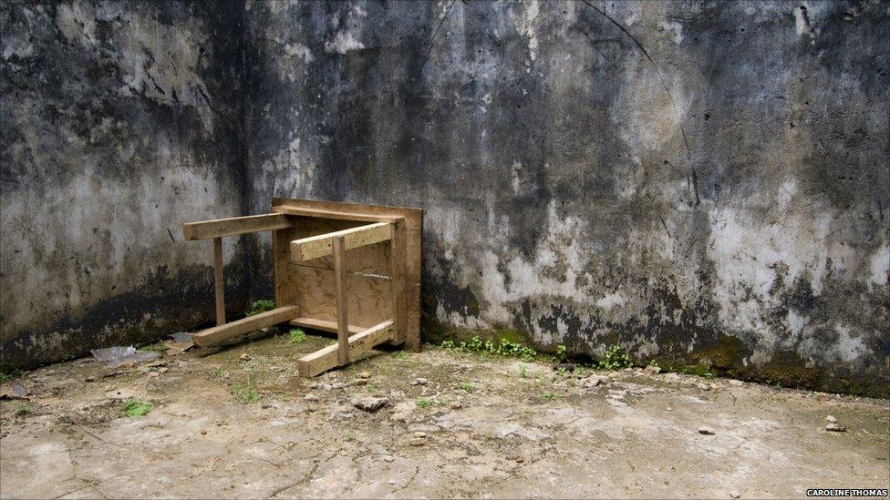 Inside a house destroyed by the rebels, Kailahun