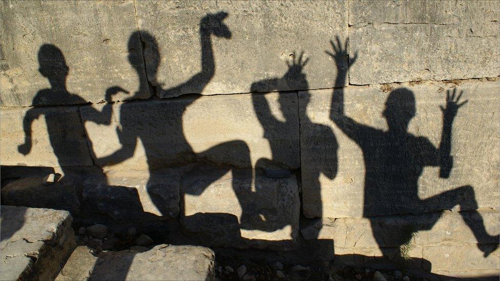 Shadows on a wall in Phaistos, Crete