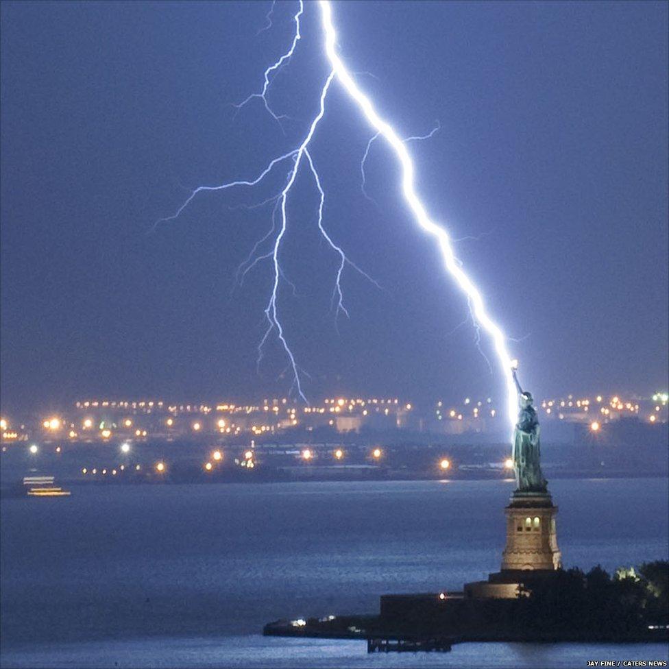 Lightning strikes the Stature of LIberty