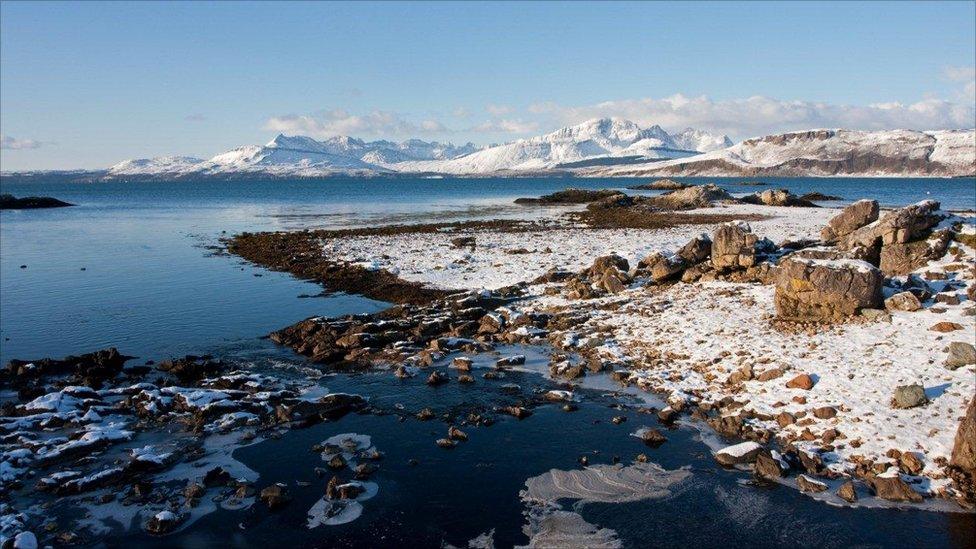 Ord beach looking across Loch Eishort to the Cuillin Mountains.